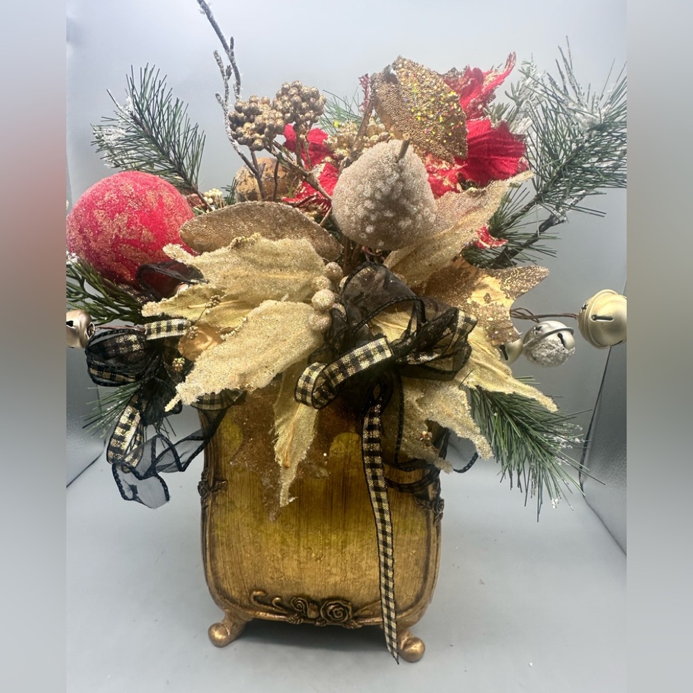 Luxurious Gold and Red Holiday Decor with Poinsettias
